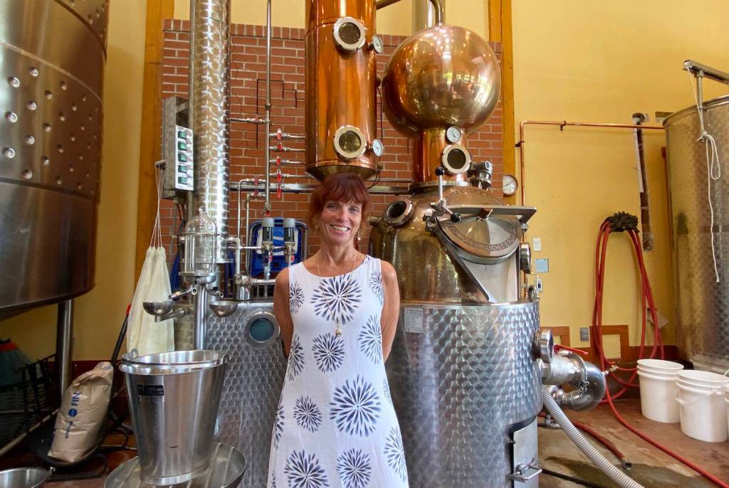 Merridale&rsquo;s co-owner Janet Docherty poses where the magic of distilling happens. Vancouver Island&rsquo;s only Whisky Festival will be bringing together eight Island whisky distillers to celebrate Island terroir at Merridale Cidery Distillery, one of the eight participants. Tickets are limited. (Chadd Cawson/Citizen)